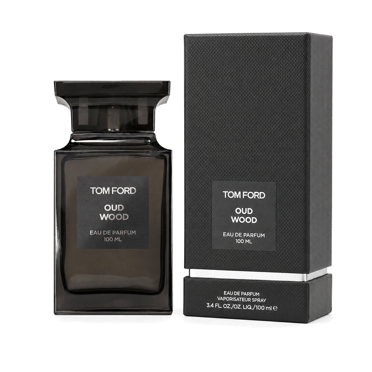Tom Ford Oud Wood Eau de Parfum 100 ml bottle and matching box on white background